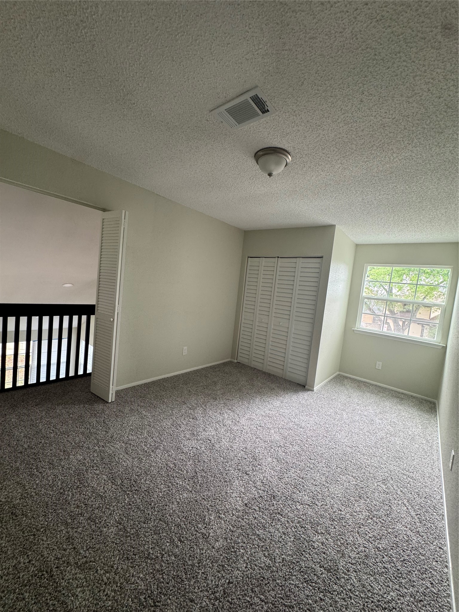 13626 Sunswept Way Houston, TX 77082 - Photo 19 of 30 an empty room with windows