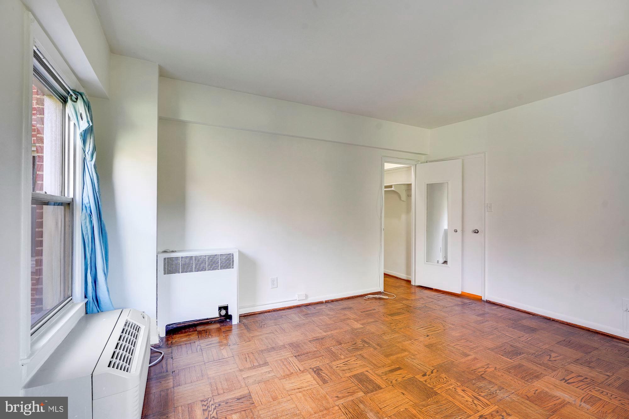 2500 Q Street Northwest, Unit 216 Washington, DC 20007 - Photo 17 of 38 a view of an empty room