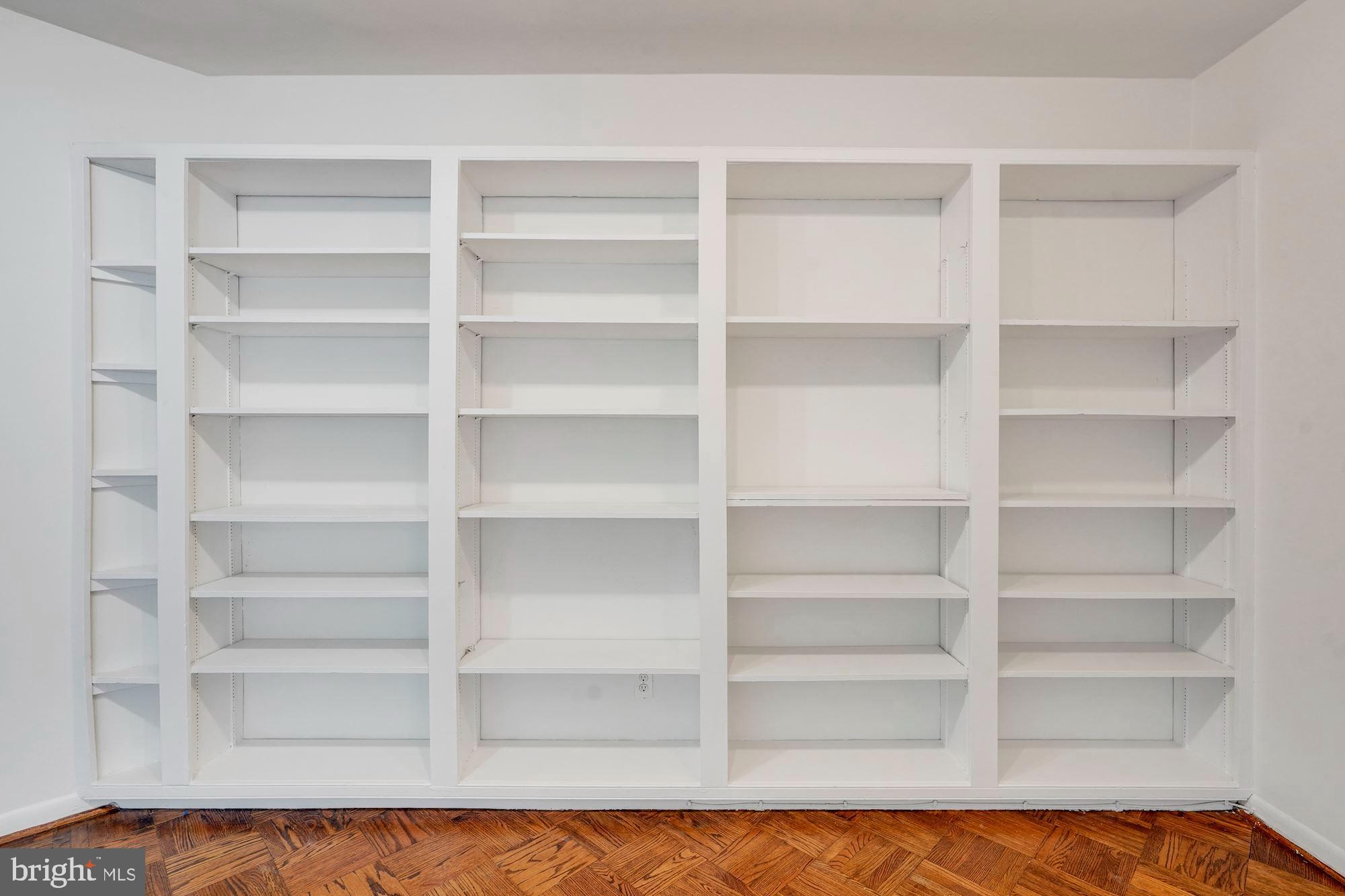 2500 Q Street Northwest, Unit 216 Washington, DC 20007 - Photo 22 of 38 a view of a room with shelf on the wall