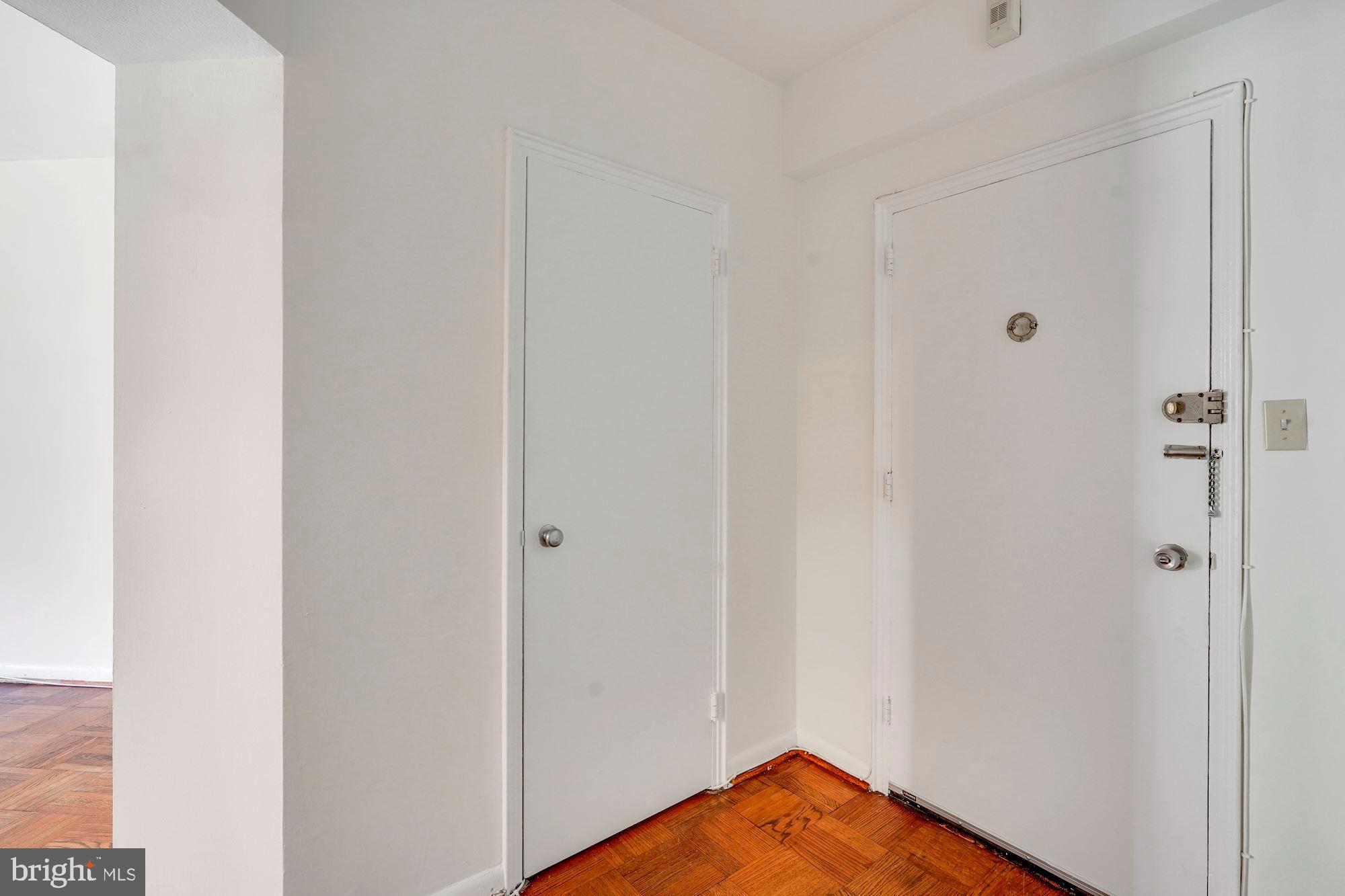 2500 Q Street Northwest, Unit 216 Washington, DC 20007 - Photo 9 of 38 a view of a room with wooden floor