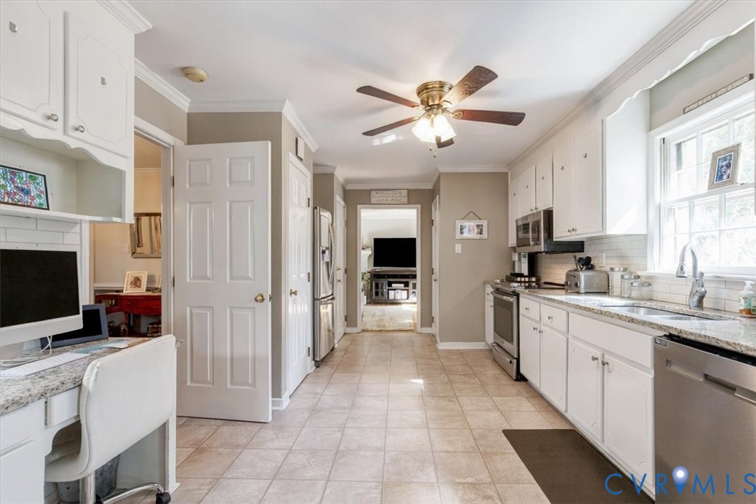 863 Watch Hill Road Midlothian, VA 23114 - Photo 23 of 62 Kitchen featuring white cabinetry, light-toned til