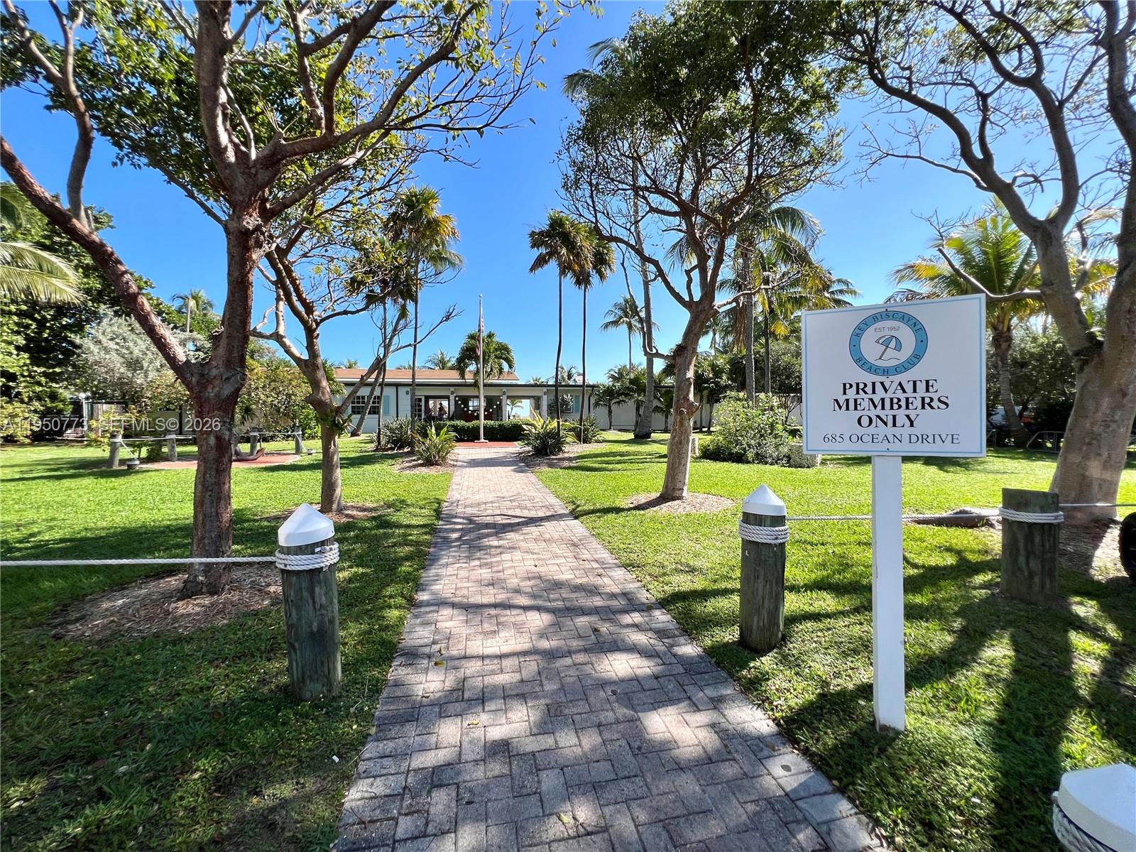 255 Sunrise Drive, Unit 308 Key Biscayne, FL 33149 - Photo 15 of 16 a park with large trees