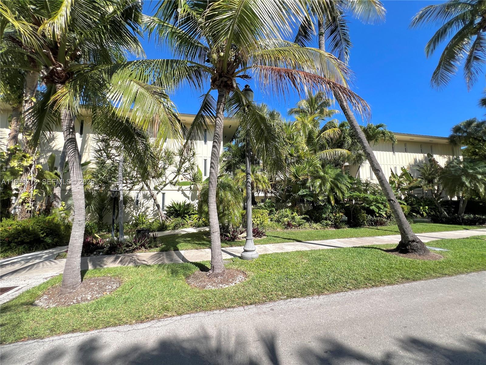 255 Sunrise Drive, Unit 308 Key Biscayne, FL 33149 - Photo 2 of 16 a view of a park with swings and slides