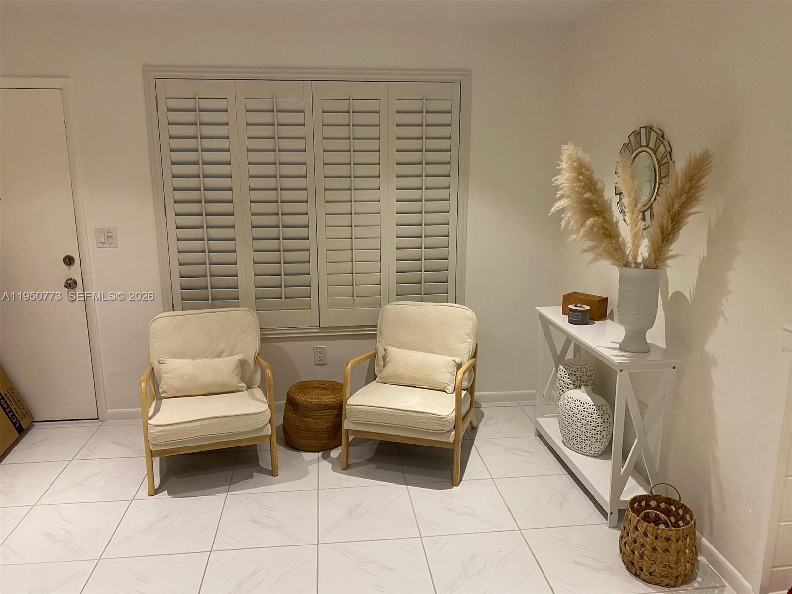 255 Sunrise Drive, Unit 308 Key Biscayne, FL 33149 - Photo 5 of 18 a bathroom with a toilet and a sink