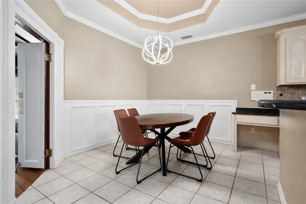 a view of a dining room with furniture