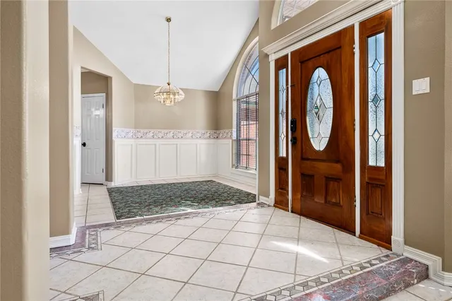 a view of a entryway door of a house