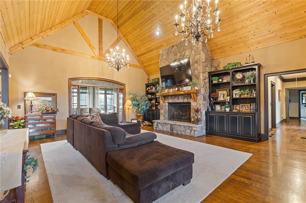 2932 Highway 124 Jefferson, GA 30549 - Photo 11 of 46 a living room with furniture and a fireplace