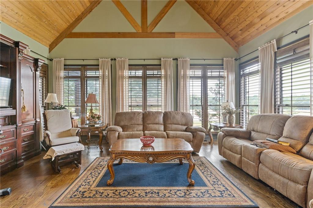 2932 Highway 124 Jefferson, GA 30549 - Photo 13 of 46 a living room with furniture a rug and a large window