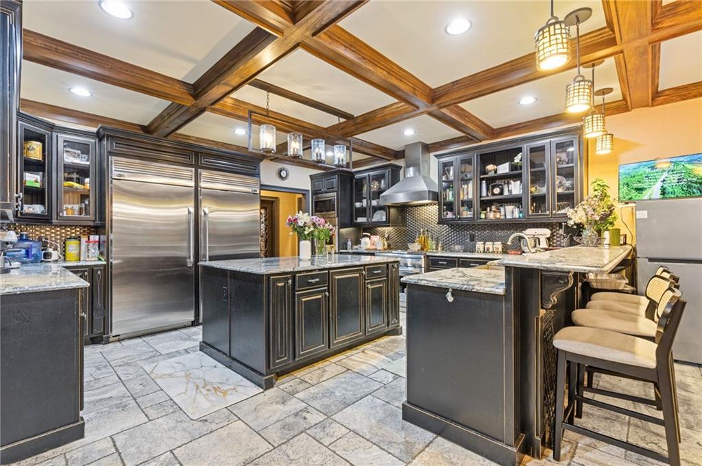 2932 Highway 124 Jefferson, GA 30549 - Photo 15 of 46 a kitchen with cabinets and stainless steel appliances