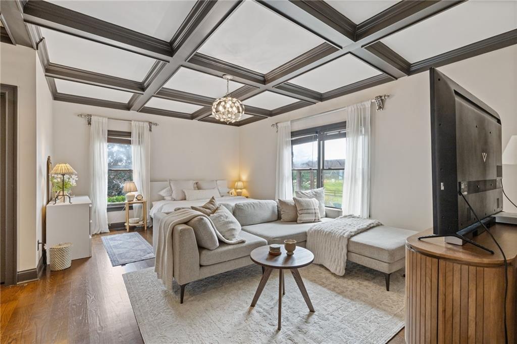2932 Highway 124 Jefferson, GA 30549 - Photo 19 of 46 a living room with furniture a ceiling fan a rug and a window
