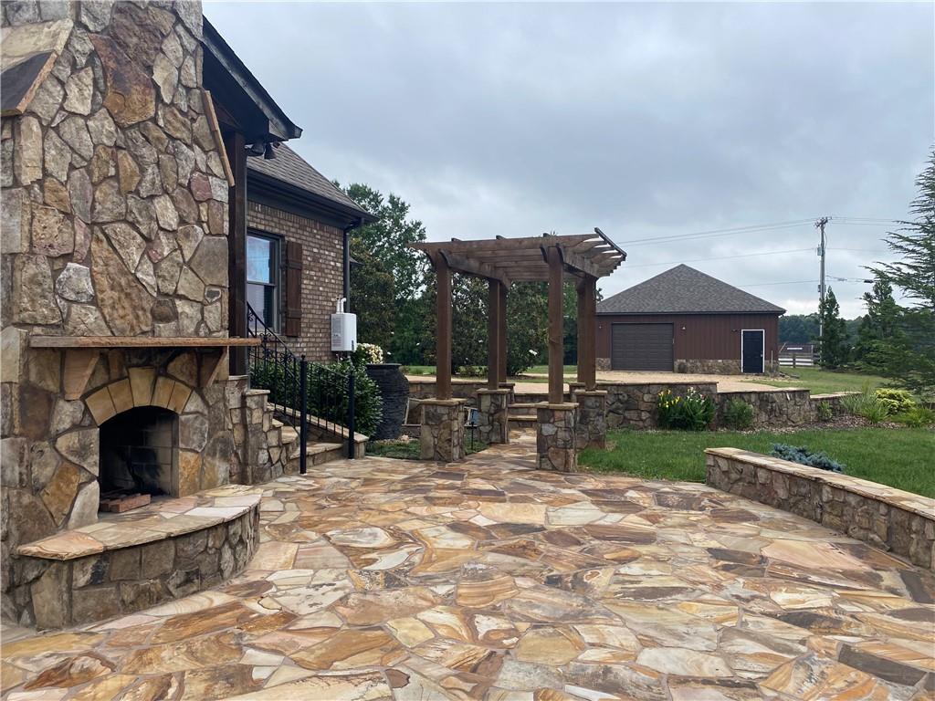 2932 Highway 124 Jefferson, GA 30549 - Photo 24 of 46 a view of house with yard and sitting area