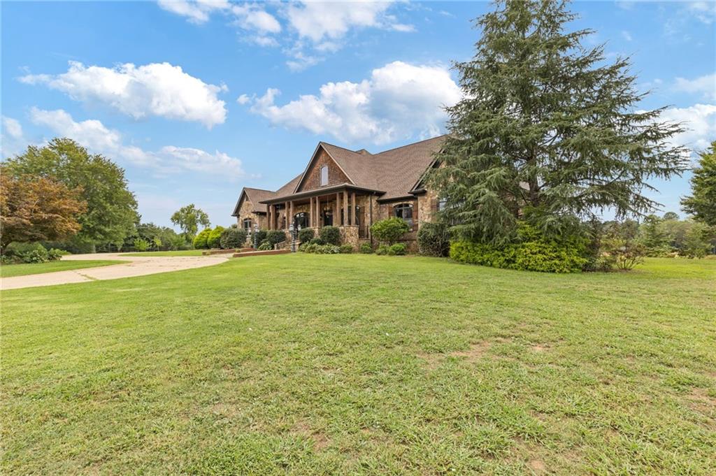 2932 Highway 124 Jefferson, GA 30549 - Photo 30 of 46 a view of a house with a big yard