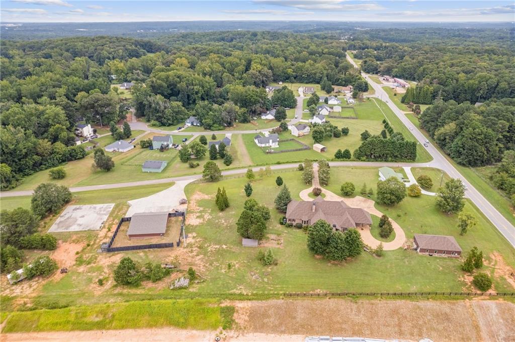 2932 Highway 124 Jefferson, GA 30549 - Photo 36 of 46 an aerial view of residential houses with outdoor space