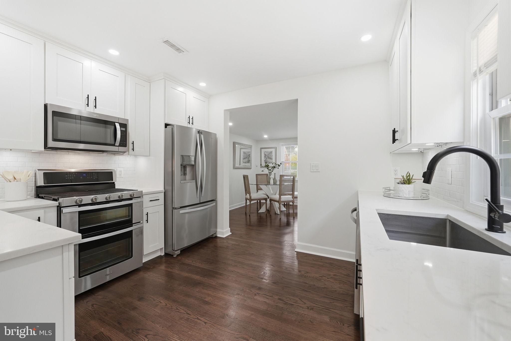 2828 West George Mason Road Falls Church, VA 22042 - Photo 6 of 36 Updated kitchen with gleaming wood floors