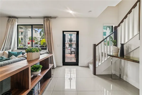 a view of an entryway with staircase