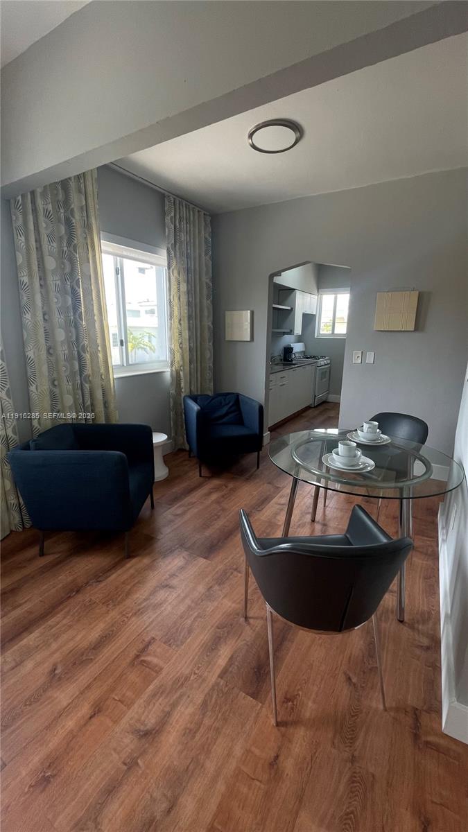 8100 Harding Avenue, Unit 508 Miami Beach, FL 33141 - Photo 19 of 20 a living room with furniture and a window