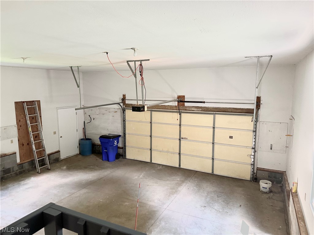 1009 Sandy Lake Road Kent, OH 44240 - Photo 29 of 35 2 car attached garage with man door & water
