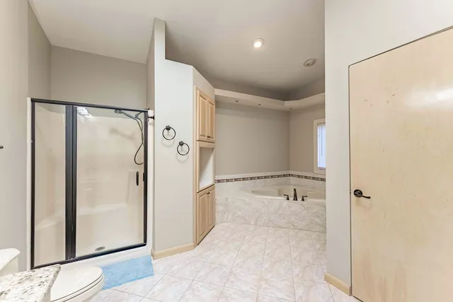 a view of a room with a washer and dryer