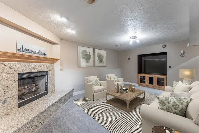 a view of a house with swimming pool yard and patio