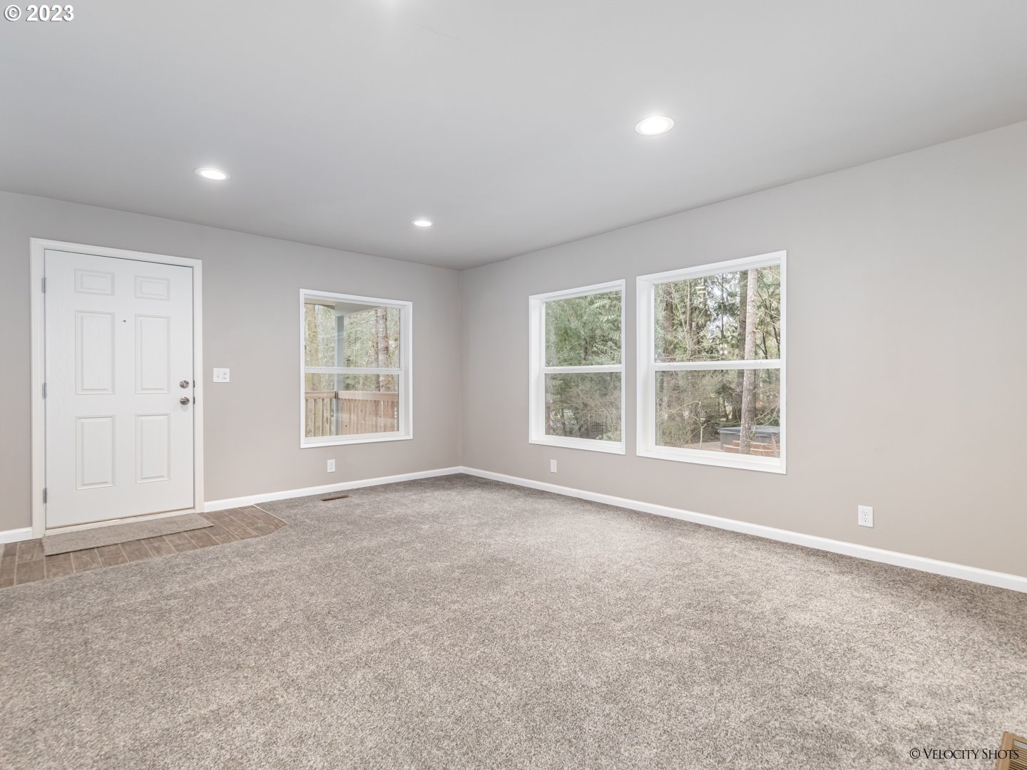 65195 East Sandy River Lane Rhododendron, OR 97049 - Photo 6 of 29 an empty room with windows