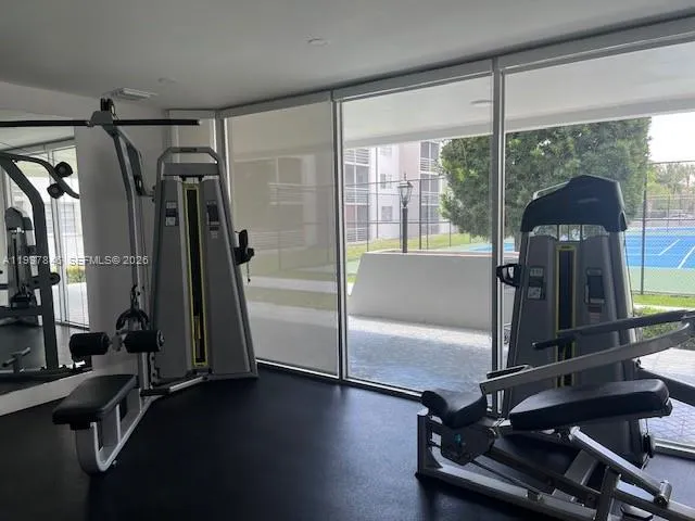 a view of a room with gym equipment