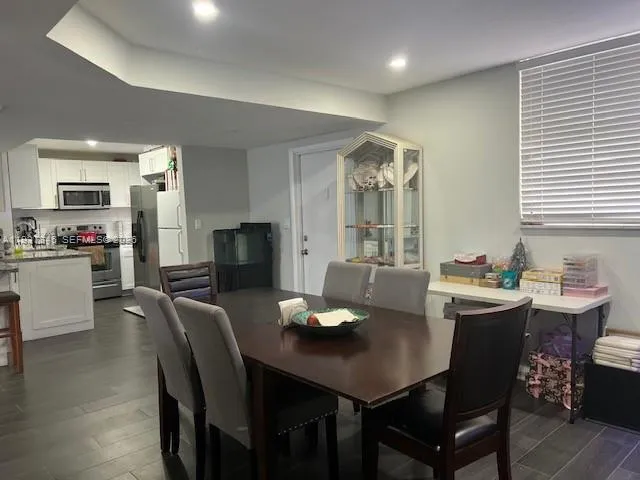 a view of a dining room with furniture