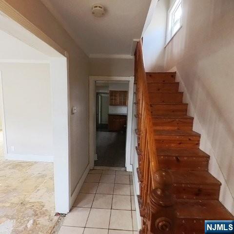 167 James Street Hackensack, NJ 07601 - Photo 8 of 30 a view of a hallway with a door and stairs