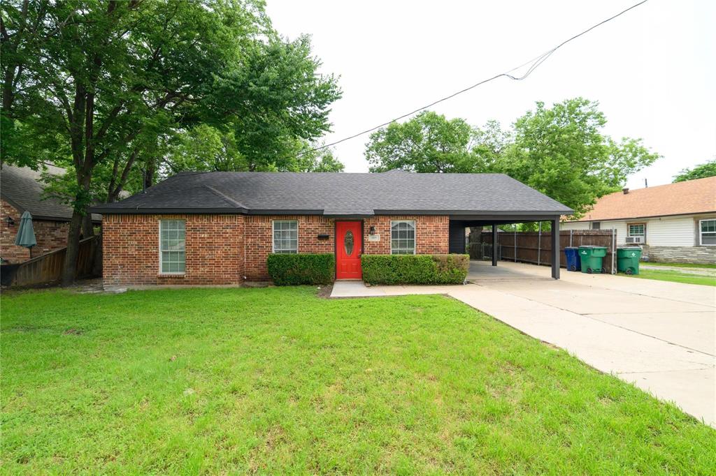 809 Wilcox Street McKinney, TX 75069 - Photo 26 of 26 Ranch-style home with an attached carport, driveway, and brick siding