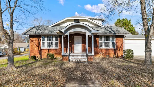 a front view of a house with a porch