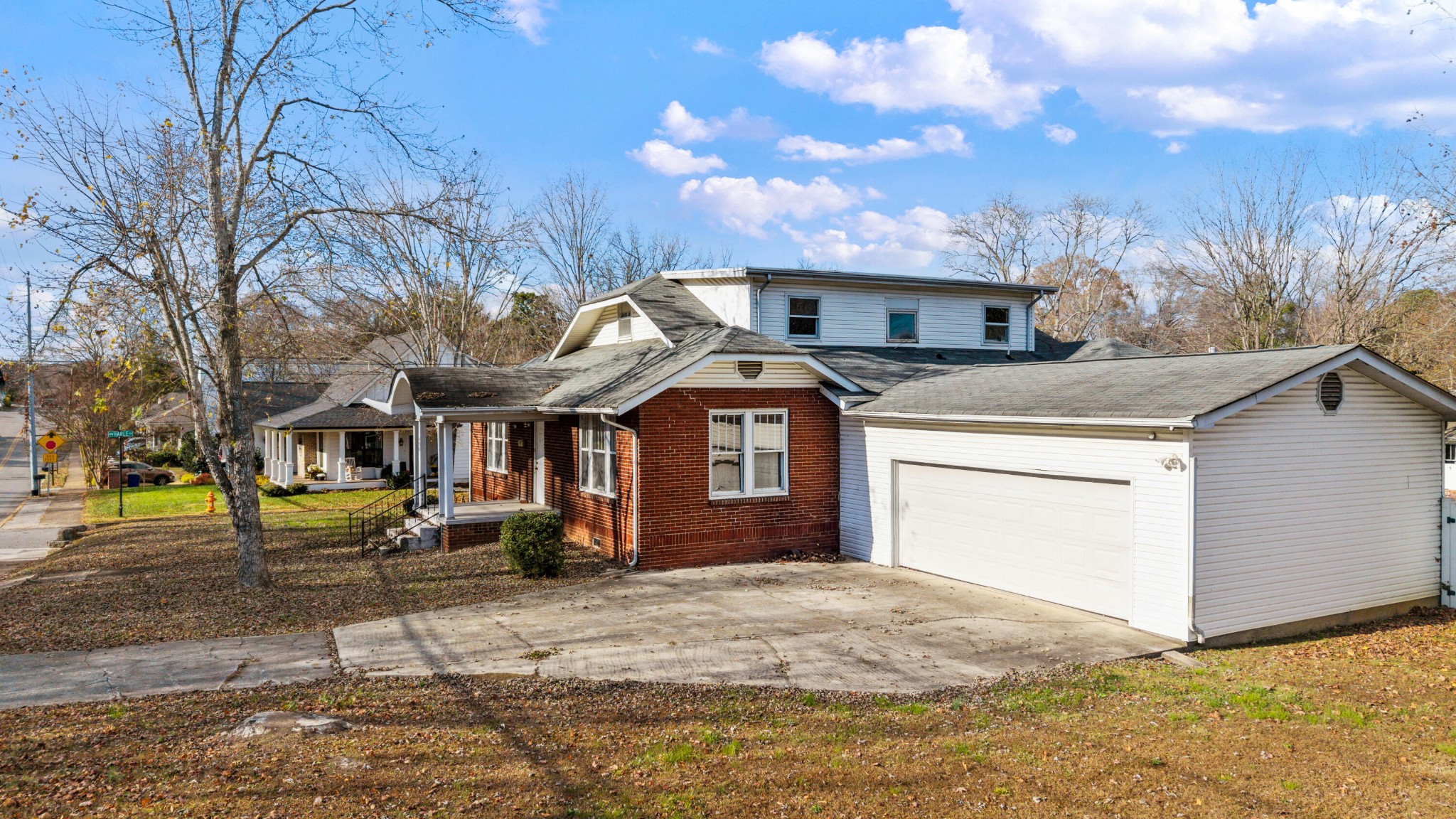 490 8th Street Northwest Cleveland, TN 37311 - Photo 7 of 9 a front view of a house with a yard