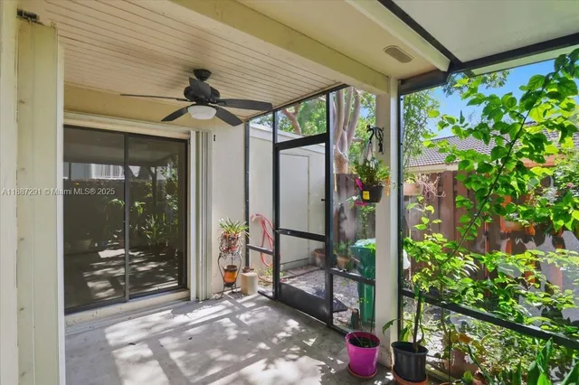 an aerial view of house with yard swimming pool and outdoor seating