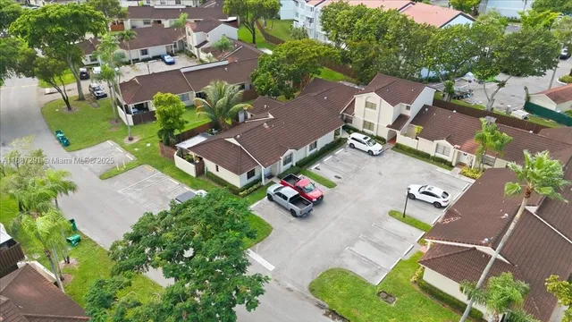 an aerial view of a house with a garden
