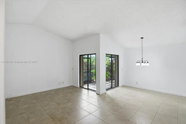 a view of a room with an entryway