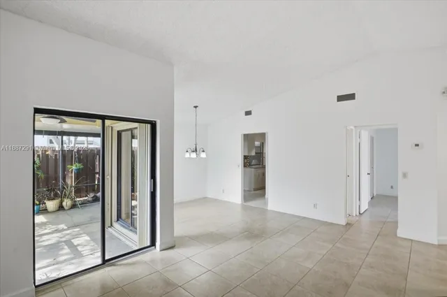 a view of an empty room and window