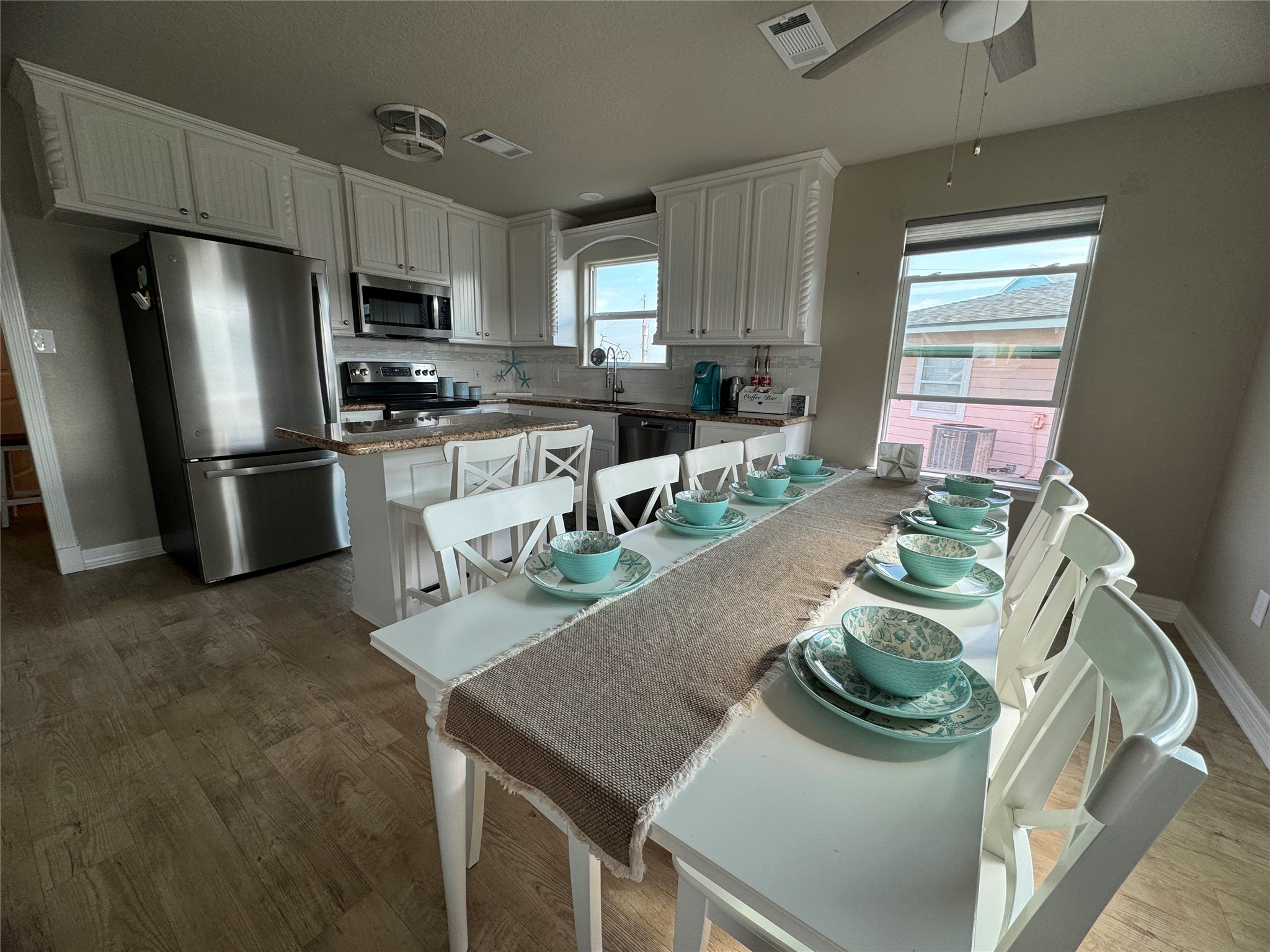 118 Point Lafitte Court Surfside Beach, TX 77541 - Photo 7 of 19 To the right are the dining area and kitchen