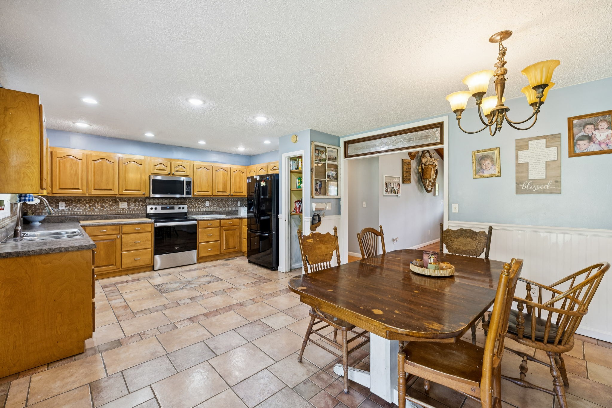 284 Duck Branch Road Fayetteville, TN 37334 - Photo 16 of 47 a kitchen with a table chairs and a dining table