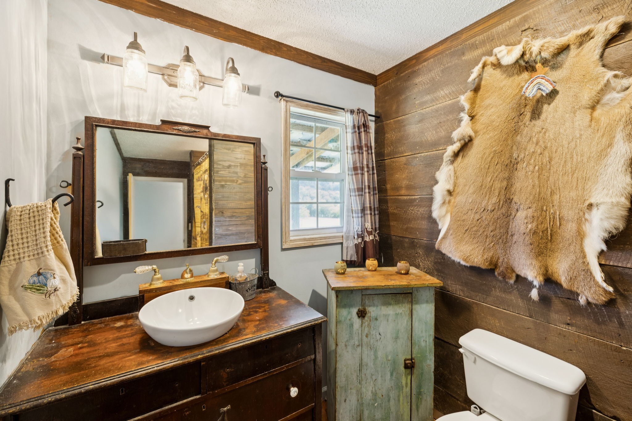 284 Duck Branch Road Fayetteville, TN 37334 - Photo 19 of 47 a bathroom with a granite countertop sink and a mirror