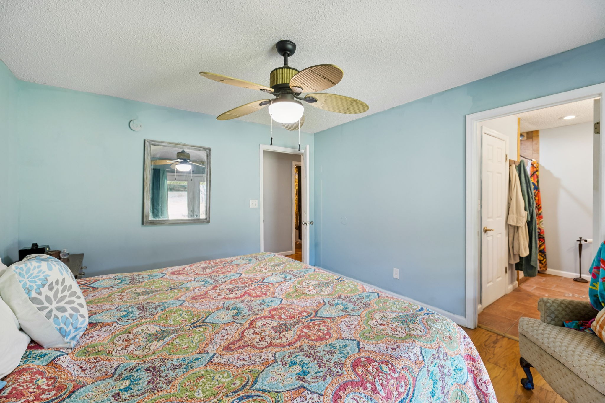 284 Duck Branch Road Fayetteville, TN 37334 - Photo 21 of 47 a bedroom with a bed and a chandelier