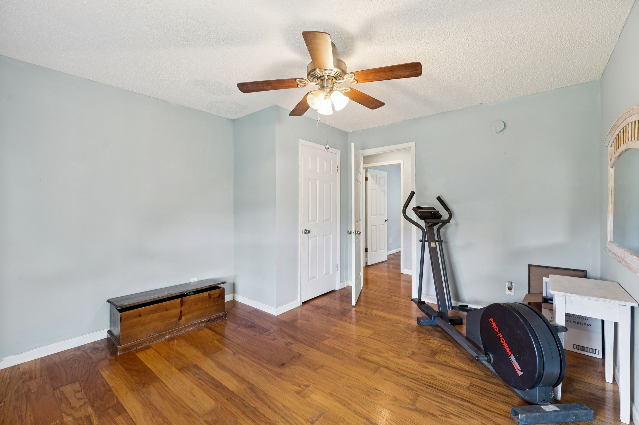 284 Duck Branch Road Fayetteville, TN 37334 - Photo 24 of 47 a bedroom with a bed and a chandelier