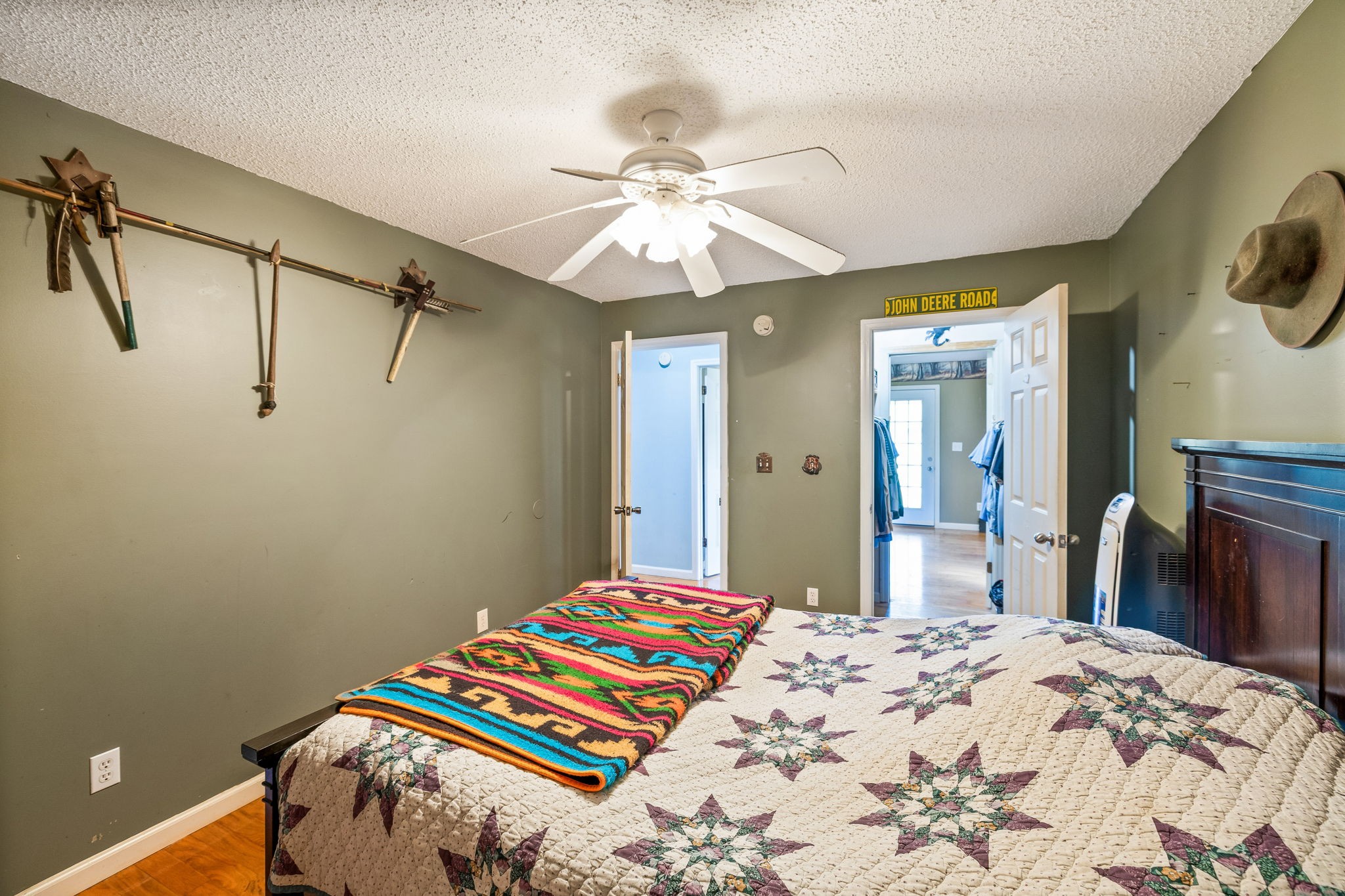 284 Duck Branch Road Fayetteville, TN 37334 - Photo 26 of 47 a bedroom with a bed and a chandelier