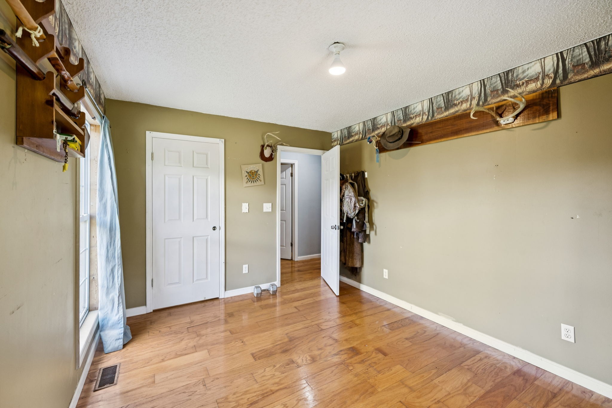 284 Duck Branch Road Fayetteville, TN 37334 - Photo 28 of 47 a view of walk in closet with clothes and shoes