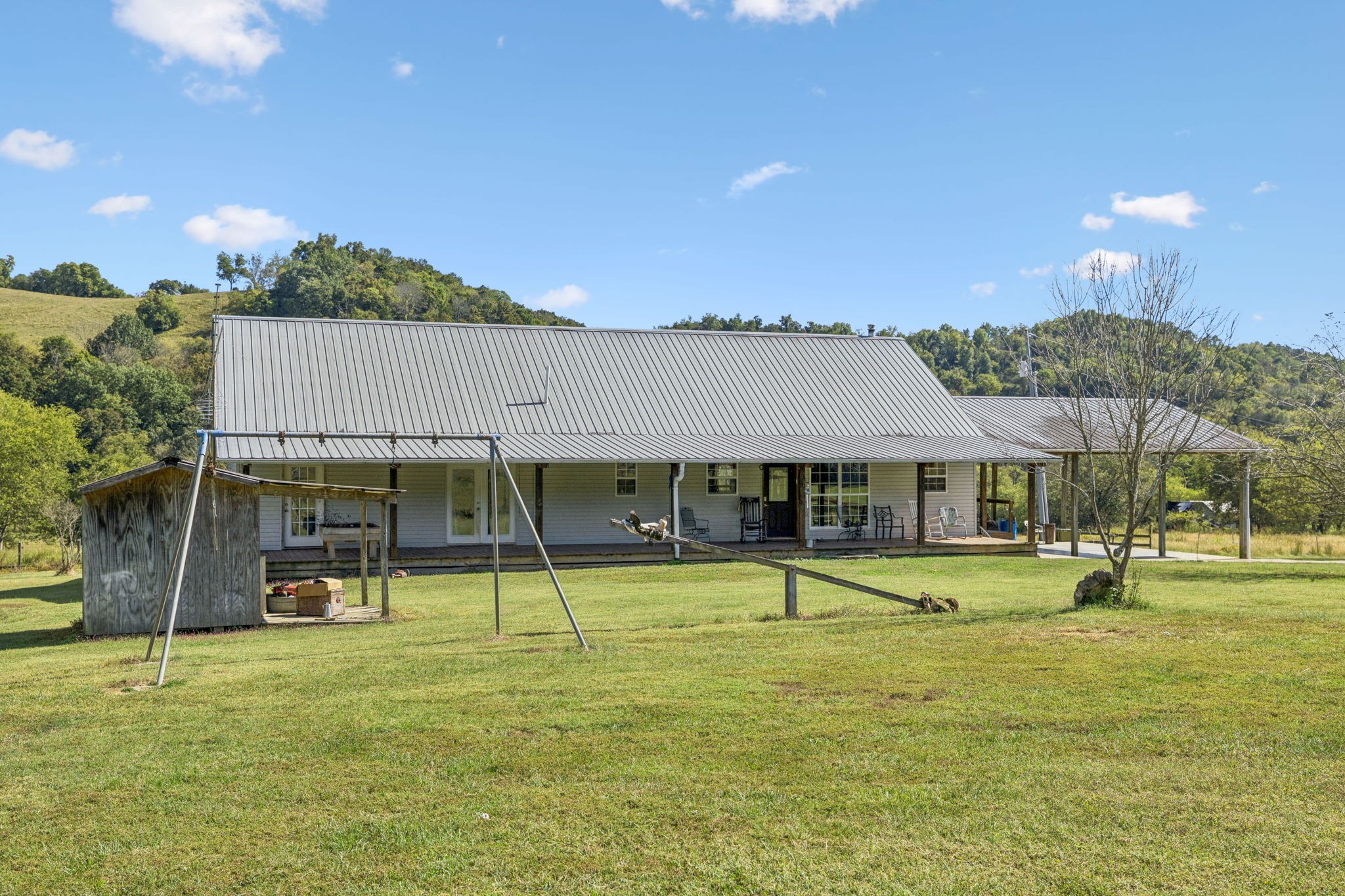 284 Duck Branch Road Fayetteville, TN 37334 - Photo 36 of 47 a view of a house with a backyard and a slide