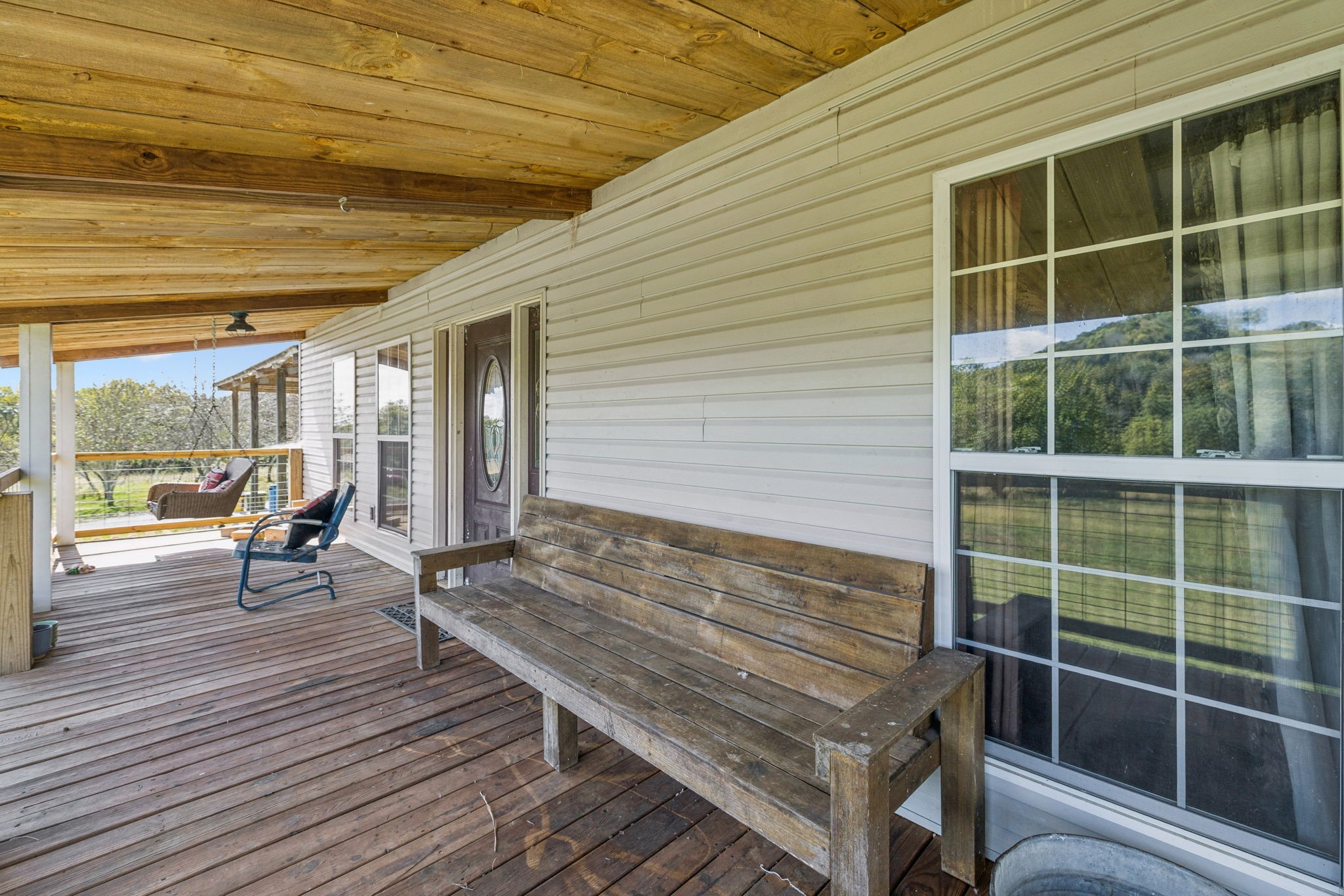 284 Duck Branch Road Fayetteville, TN 37334 - Photo 7 of 47 a building outdoor space with wooden floor and a bench