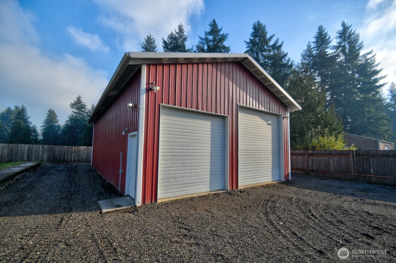 19140 Rosemary Street Southwest Rochester, WA 98579 - Photo 19 of 26 a view of a house with a yard