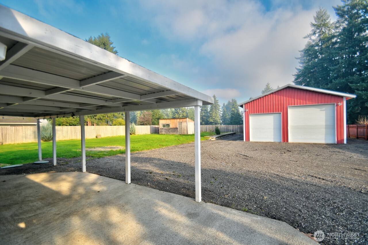 19140 Rosemary Street Southwest Rochester, WA 98579 - Photo 24 of 26 a view of a house with a backyard