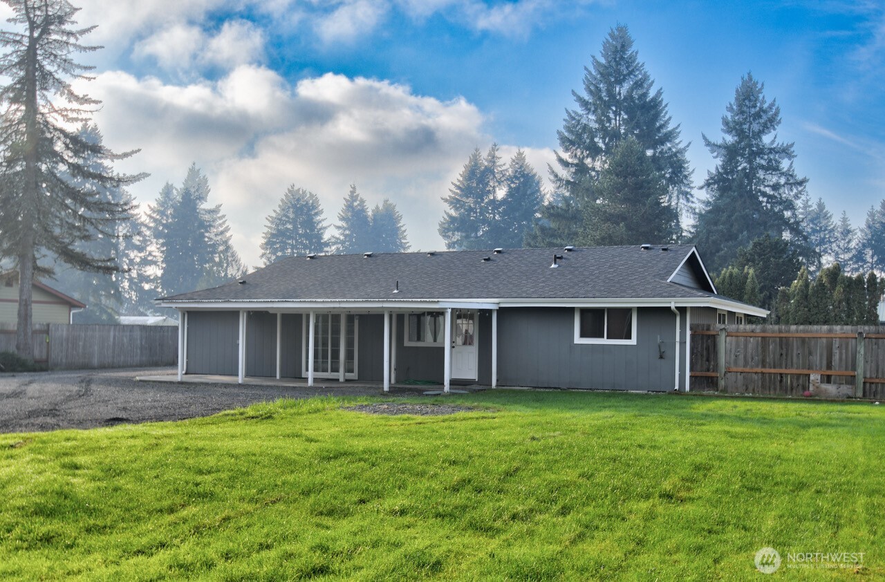 19140 Rosemary Street Southwest Rochester, WA 98579 - Photo 26 of 26 a view of house with yard and front view of a house