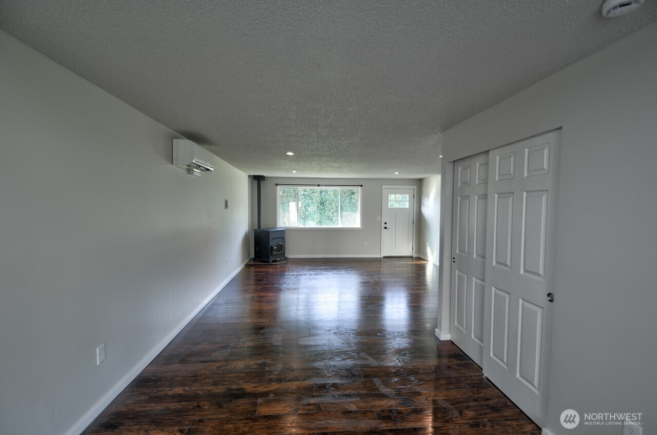 19140 Rosemary Street Southwest Rochester, WA 98579 - Photo 9 of 26 a view of empty room with window