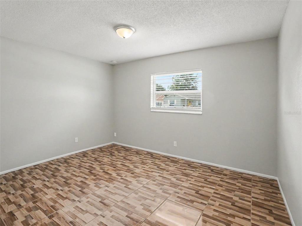 615 Thomas Jefferson Way Orlando, FL 32809 - Photo 10 of 17 a view of a room with a window