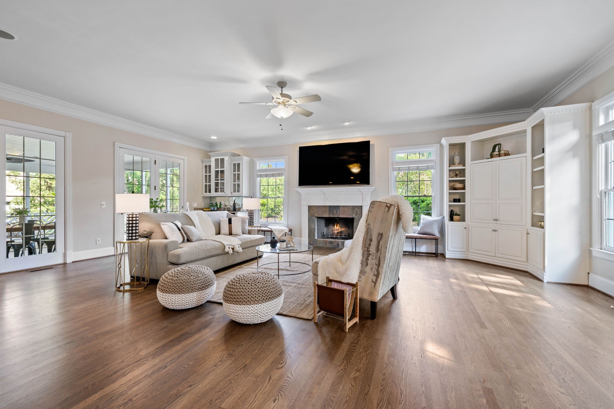 701 Sinclair Circle Brentwood, TN 37027 - Photo 28 of 70 a living room with furniture a fireplace and a flat screen tv