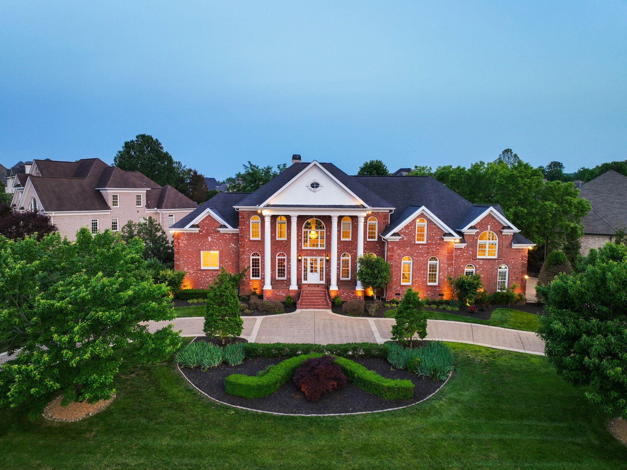 701 Sinclair Circle Brentwood, TN 37027 - Photo 8 of 70 a front view of a house with a yard